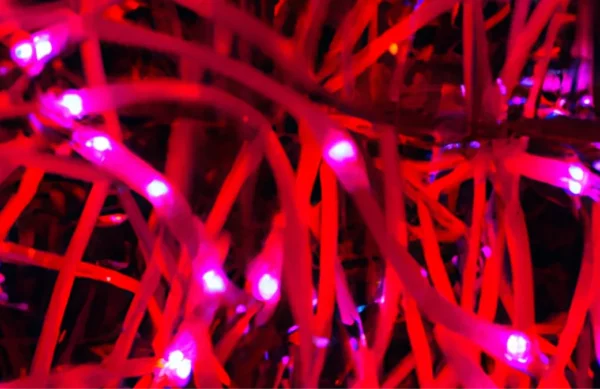DALL_E_2023-06-29_10.46.21_-_beaufiful_displays_of_red_lights_shapes_hyper_realistic-752550