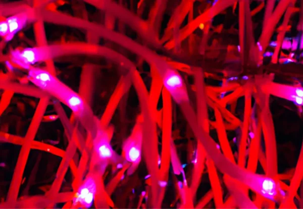 DALL_E_2023-06-29_10.46.21_-_beaufiful_displays_of_red_lights_shapes_hyper_realistic-752550